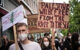 Pro-Palestinian protesters in Berlin, Germany take part in a demonstration against Israel amid the fighting in Gaza between the Israeli military and Hamas, May 15, 2021. (Stefanie Loos/AFP)