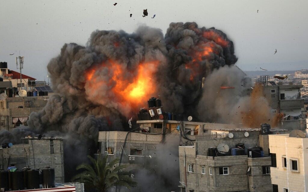 A ball of fire erupts from a building in Gaza City's al-Rima neighborhood on May 16, 2021, during a massive Israeli bombardment on the Hamas-controlled enclave. (Bashar Taleb/AFP)