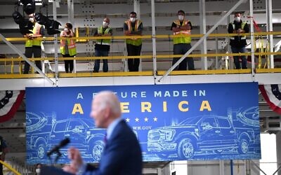 Workers listen to US President Joe Biden speak at the Ford Rouge Electric Vehicle Center, in Dearborn, Michigan on May 18, 2021. (Nicholas Kamm / AFP)