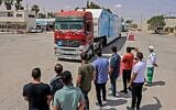 A Jordanian mobile field hospital passes into Rafah in the southern Gaza Strip, through the Kerem Shalom crossing, the main passage point for goods entering Gaza from Israel, on May 21, 2021, after a ceasefire brokered by Egypt between Israel and the Palestinian Hamas  terror group. (SAID KHATIB / AFP)