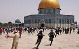 Israeli security forces and Palestinian Muslim worshippers clash at Jerusalem's Al-Aqsa Mosque compound, at Temple Mount, on May 21, 2021. (AHMAD GHARABLI / AFP)