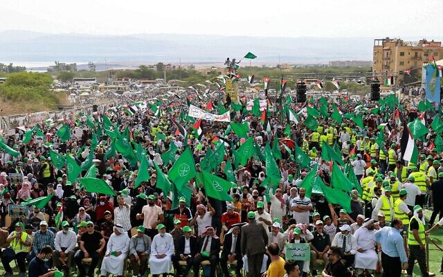 Supporters of Jordan's Muslim Brotherhood take part in a protest in the village of Sweimeh, near the Jordanian border with the West Bank, on May 21, 2021 (Khalil MAZRAAWI / AFP) Supporters of Jordan's Muslim Brotherhood take part in a protest in the village of Sweimeh, near the Jordanian border with the West Bank, on May 21, 2021 (Khalil MAZRAAWI / AFP)