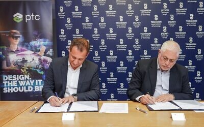 Technion President Professor Uri Sivan, right, and Ziv Belfer, Divisional Vice President of Global Research and Development and General Manager, PTC, sign accord for R&D center; April 26, 2021 (Nitzan Zohar, Technion Spokesperson’s Office)