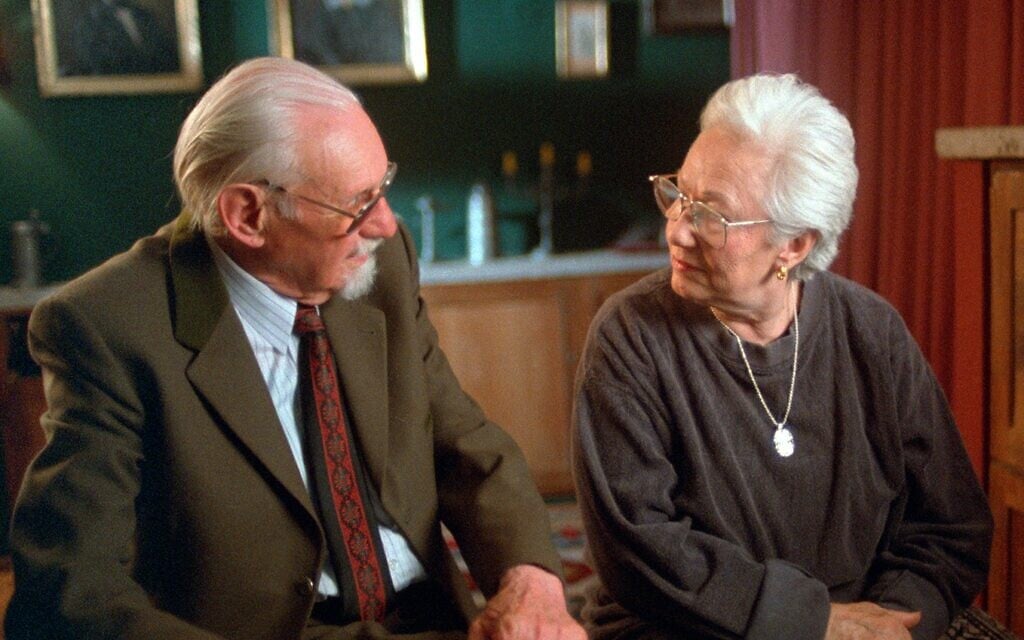 Renée Firestone speaks with Auschwitz doctor Hans Munch in the 1998 documentary, 'The Last Days.' (Courtesy)
