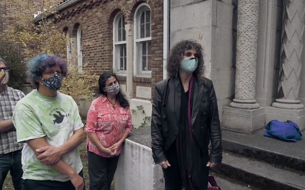 From left: Jonathan Rosenblum of Kadima Reconstructionist Community, along with Koloud Tarapolsi and Samia El-Moslimany of the Cherry Street Mosque, are part of the group rallying to save the building and turn it into an interfaith community center. (Screenshot/YouTube)