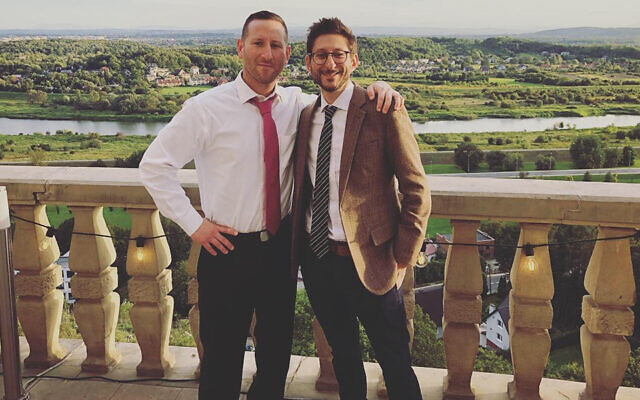 Danny Fenster, right, with his brother Bryan at a friend's wedding in Krakow, Poland in September 2019. (Courtesy of Bryan Fenster via JTA) Danny Fenster, right, with his brother Bryan at a friend's wedding in Krakow, Poland in September 2019. (Courtesy of Bryan Fenster via JTA)
