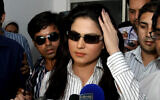 Pakistani actress Veena Malik talks to media at a local police station in Lahore, Pakistan on April 13, 2010. (AP Photo/K.M.Chaudary)
