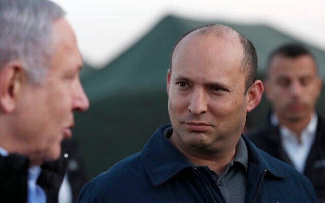 In this November 24, 2019 file photo, then-Prime Minister Benjamin Netanyahu, left, and then-Defense Minister Naftali Bennett, visit an Israeli army base in the Golan Heights, on the Israeli-Syrian border. (Atef Safadi/Pool via AP) In this November 24, 2019 file photo, then-Prime Minister Benjamin Netanyahu, left, and then-Defense Minister Naftali Bennett, visit an Israeli army base in the Golan Heights, on the Israeli-Syrian border. (Atef Safadi/Pool via AP)