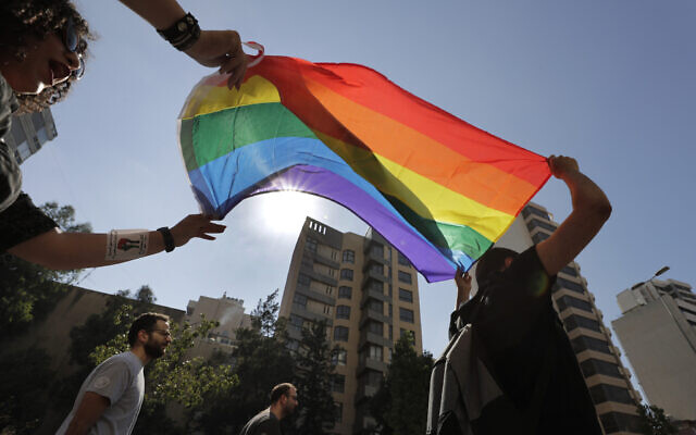 Activists from the Lesbian, Gay, Bisexual, and Transgender (LGBT) community in Lebanon shout slogans and hold up a rainbow flags as they march in which they are calling on the government for more rights in the country gripped by economic and financial crisis during ongoing protests in Beirut, Lebanon, June 27, 2020. (AP Photo/Hassan Ammar) Activists from the Lesbian, Gay, Bisexual, and Transgender (LGBT) community in Lebanon shout slogans and hold up a rainbow flags as they march in which they are calling on the government for more rights in the country gripped by economic and financial crisis during ongoing protests in Beirut, Lebanon, June 27, 2020. (AP Photo/Hassan Ammar)