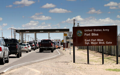 Cars wait to enter Fort Bliss in El Paso, Texas, September 9, 2014. (Juan Carlos Llorca/AP)