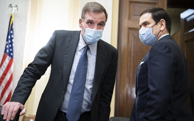 Committee Chairman Senator Mark Warner, left, and vice chairman Senator Marco Rubio, arrive for the Senate Select Intelligence Committee confirmation hearing for William Burns, nominee for Central Intelligence Agency director, February 24, 2021 on Capitol Hill in Washington. (Tom Williams/Pool via AP) Committee Chairman Senator Mark Warner, left, and vice chairman Senator Marco Rubio, arrive for the Senate Select Intelligence Committee confirmation hearing for William Burns, nominee for Central Intelligence Agency director, February 24, 2021 on Capitol Hill in Washington. (Tom Williams/Pool via AP)