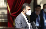 In this file photo dated April 20, 2021, Iran's governor to the International Atomic Energy Agency, IAEA, Kazem Gharib Abadi leaves the 'Grand Hotel Vienna' where closed-door nuclear talks take place in Vienna, Austria. (AP Photo/Lisa Leutner, FILE)