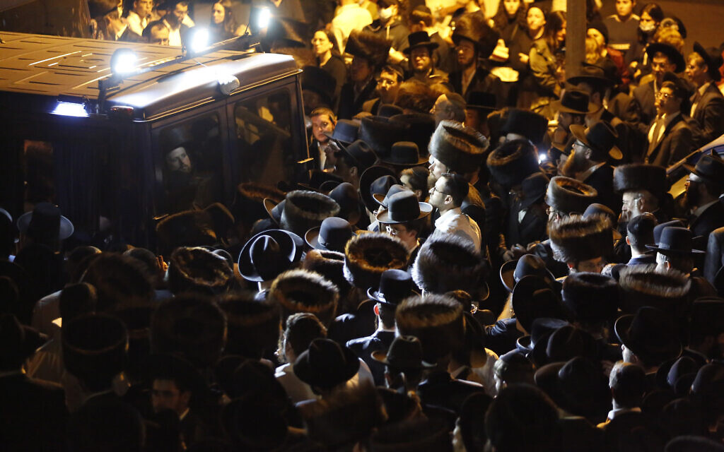 Mourners gather for the funeral of Eliyahu Cohen, who died during Lag B'Omer celebrations at Mount Meron in northern Israel, at his funeral in Jerusalem on May 1 2021. (AP Photo/Ariel Schalit)
