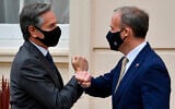 Britain's Foreign Secretary Dominic Raab, right, welcomes US Secretary of State Antony Blinken ahead of bilateral talks as part of the G7 foreign ministers meeting near London on May 3, 2021. (Ben Stansall / Pool via AP)