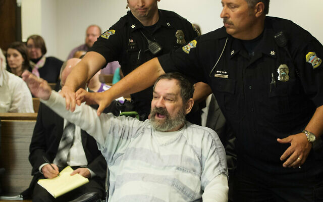 Frazier Glenn Miller Jr., convicted of capital murder, attempted murder and other charges, gestures as Johnson County deputies remove him from the courtroom during the sentencing phase of his trial at the Johnson County District Court in Olathe, Kan. November 10, 2015. (Joe Ledford/The Kansas City Star via AP, Pool, File) Frazier Glenn Miller Jr., convicted of capital murder, attempted murder and other charges, gestures as Johnson County deputies remove him from the courtroom during the sentencing phase of his trial at the Johnson County District Court in Olathe, Kan. November 10, 2015. (Joe Ledford/The Kansas City Star via AP, Pool, File)