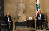 French Foreign Minister Jean-Yves Le Drian, left, meets with Lebanese President Michel Aoun at the Presidential Palace in Baabda, east of Beirut, Lebanon, May 6, 2021. (AP Photo/Hussein Malla)