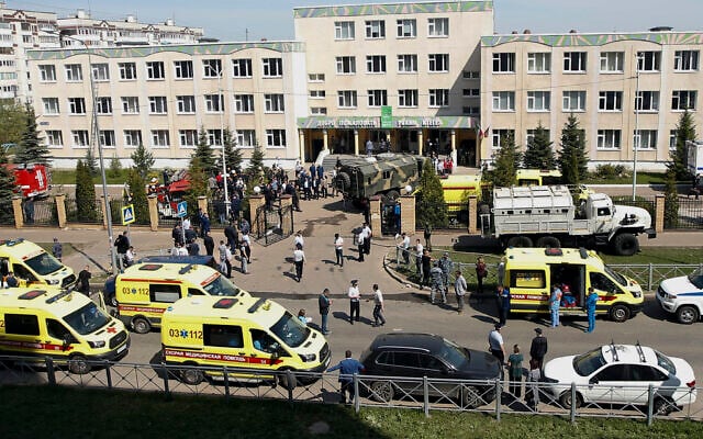 Ambulances, police cars and a truck are parked at a school after a shooting in Kazan, Russia, May 11, 2021. (AP Photo/Roman Kruchinin) Ambulances, police cars and a truck are parked at a school after a shooting in Kazan, Russia, May 11, 2021. (AP Photo/Roman Kruchinin)