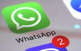 Illustrative: The WhatsApp communications app on a smartphone, (AP Photo/Patrick Sison)