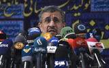 Former Iranian president Mahmoud Ahmadinejad speaks with the media after registering his name as a candidate for the June 18 presidential elections at elections headquarters of the Interior Ministry in Tehran, Iran, May 12, 2021. (AP Photo/Vahid Salemi)