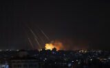 Smoke rises following Israeli missile strikes on Gaza City, Thursday, May 13, 2021. (AP Photo/Khalil Hamra)