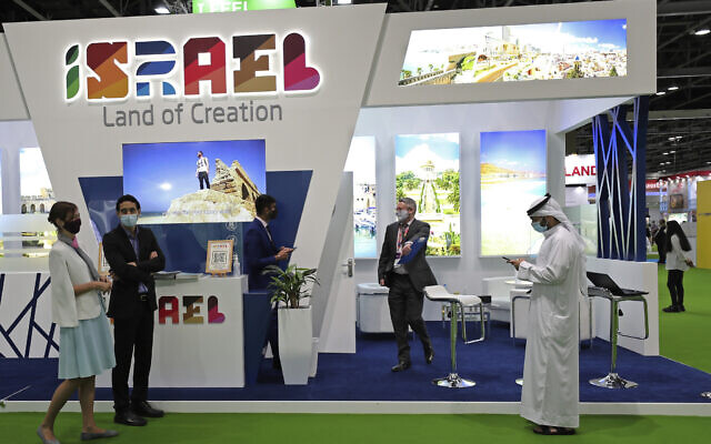 Israeli exhibitors receive visitors at their stand on the opening day of the Arabian Travel Market exhibition, in Dubai, United Arab Emirates, Sunday, May 16, 2021. (AP Photo/Kamran Jebreili) Israeli exhibitors receive visitors at their stand on the opening day of the Arabian Travel Market exhibition, in Dubai, United Arab Emirates, Sunday, May 16, 2021. (AP Photo/Kamran Jebreili)