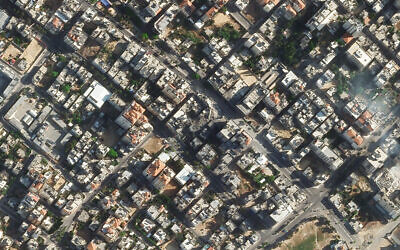The rubble of a Gaza Strip high-rise building destroyed by the IDF is seen via satellite image, May 16, 2021. (Planet Labs Inc. via AP)