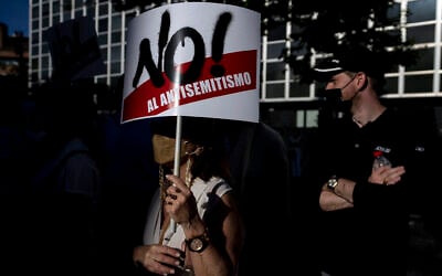 People gather during a pro-Israel demonstration in front of the Israeli Embassy in Madrid, Spain, Thursday, May 20, 2021. Banner reads in Spanish: "No to antisemitism." (AP Photo/Manu Fernandez) People gather during a pro-Israel demonstration in front of the Israeli Embassy in Madrid, Spain, Thursday, May 20, 2021. Banner reads in Spanish: "No to antisemitism." (AP Photo/Manu Fernandez)