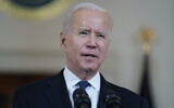 US President Joe Biden speaks about a ceasefire between Israel and the Gaza-ruling Hamas terror group, in the Cross Hall of the White House, May 20, 2021, in Washington. (AP Photo/Evan Vucci)