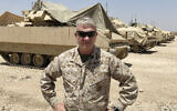 Marine Gen. Frank McKenzie, the top US commander for the Middle East, speaks to the media after arriving in Syria to meet with US and allied commanders and troops, May 21, 2021. (AP Photo/Lolita C. Baldor)
