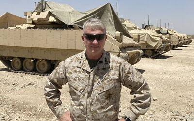 Marine Gen. Frank McKenzie, the top US commander for the Middle East, speaks to the media after arriving in Syria to meet with US and allied commanders and troops, May 21, 2021. (AP Photo/Lolita C. Baldor)