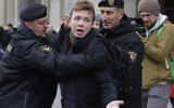 In this March 26, 2017 file photo, Belarus police detain journalist Raman Pratasevich, center, in Minsk, Belarus. Raman Pratasevich, a founder of a messaging app channel that has been a key information conduit for opponents of Belarus’ authoritarian president, has been arrested after an airliner in which he was riding was diverted to Belarus because of a bomb threat. . ﻿﻿(AP Photo/Sergei Grits, File)