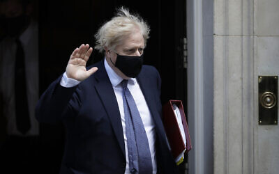 British Prime Minister Boris Johnson waves at the media as he leaves 10 Downing Street in London, May 19, 2021. (AP Photo/Matt Dunham, FILE) British Prime Minister Boris Johnson waves at the media as he leaves 10 Downing Street in London, May 19, 2021. (AP Photo/Matt Dunham, FILE)
