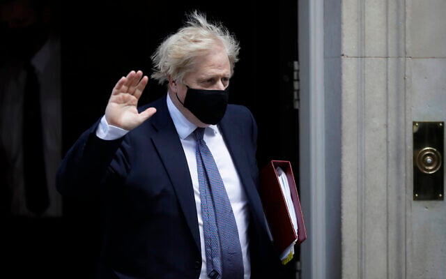 British Prime Minister Boris Johnson waves at the media as he leaves 10 Downing Street in London, May 19, 2021. (AP Photo/Matt Dunham, FILE) British Prime Minister Boris Johnson waves at the media as he leaves 10 Downing Street in London, May 19, 2021. (AP Photo/Matt Dunham, FILE)