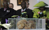 In this Thursday, Sept. 29, 2011 file photo skulls of Ovaherero and Nama people are displayed during a devotion attended by representatives of the tribes from Namibia in Berlin, Germany. Germany has reached an agreement with Namibia that will see it officially recognize as genocide the colonial-era killings of tens of thousands of people and commit to spending a total of 1.1 billion euros ($1.3 billion), largely on development projects. (AP Photo/Michael Sohn)