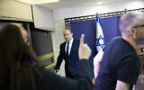 Yamina party leader Naftali Bennett arrives to speak from the Knesset on May 30, 2021, in an address at which he said he was working to firm a unity government with Yesh Atid's Yair Lapid. (Yonatan Sindel/Pool via AP)
