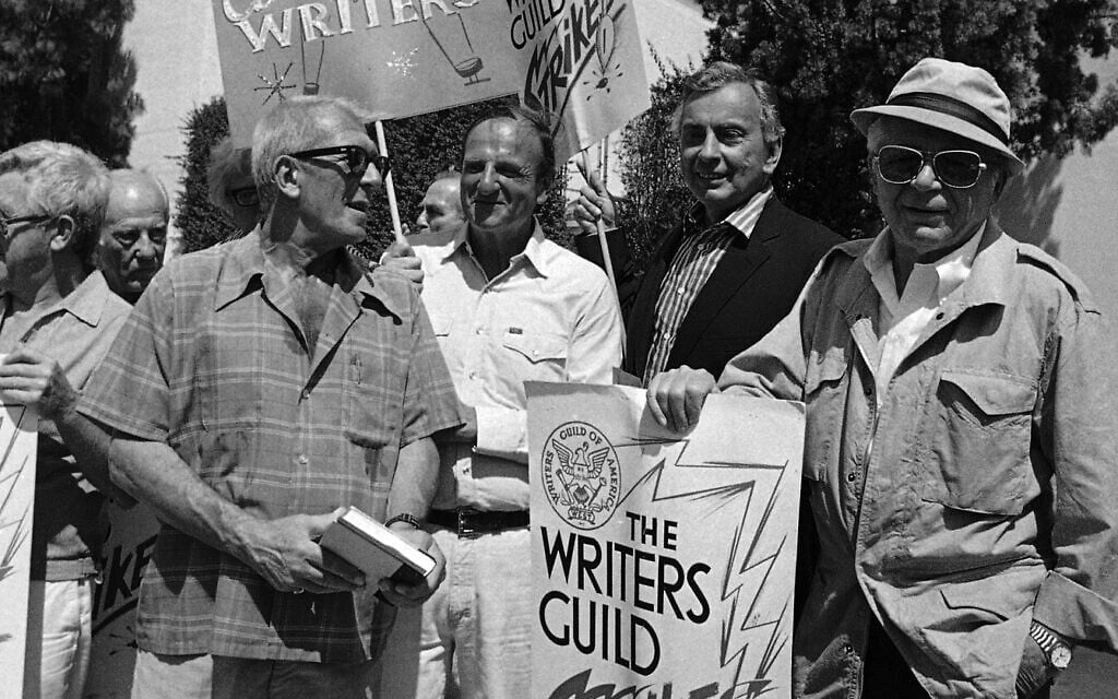 Oscar-winning writers, from left, Richard Brooks, Bo Goldman, Gore Vidal and Billy Wilder join members of the Writers Guild of America during a massive picket outside the 20th Century Fox studios in Los Angeles, June 25, 1981. (AP Photo/ Wally Fong)