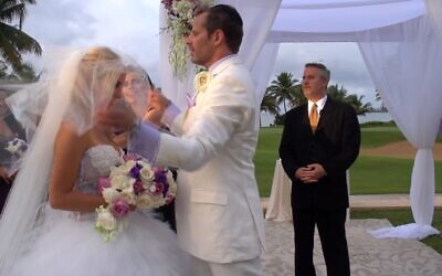 Screenshot of David and Leila Centner at their wedding, from an undated video. (Via JTA)
