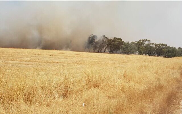 Land in southern Israel, near the Gaza border, burns possibly as a result of incendiary balloons sent from Gaza on May 7, 2021. (Moshe Baruchi/KKL-JNF/courtesy) Land in southern Israel, near the Gaza border, burns possibly as a result of incendiary balloons sent from Gaza on May 7, 2021. (Moshe Baruchi/KKL-JNF/courtesy)