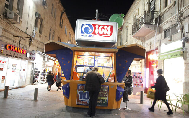 Illustrative: An Israeli man at a "lotto" booth in the center of Jerusalem. (Miriam Alster/Flash90) Illustrative: An Israeli man at a "lotto" booth in the center of Jerusalem. (Miriam Alster/Flash90)