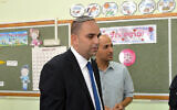 Lod Mayor Yair Revivo voting at a polling station in the mixed Jewish-Arab city of Lod when he was running for mayor, October 22, 2013. (Yossi Zeliger/FLASH90)