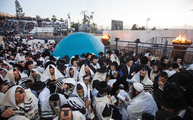 File: Ultra-Orthodox men take part in celebrations of Lag B'Omer on Mt. Meron, at the gravesite of Rabbi Shimon Bar Yochai, May 17, 2014 (Flash90) File: Ultra-Orthodox men take part in celebrations of Lag B'Omer on Mt. Meron, at the gravesite of Rabbi Shimon Bar Yochai, May 17, 2014 (Flash90)