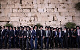 Ultra-Orthodox Jewish men dance at the end of the Jewish holiday of Shavuot, at the Western Wall, in the Old City of Jerusalem on June 9, 2019. (Aharon Krohn/Flash90)