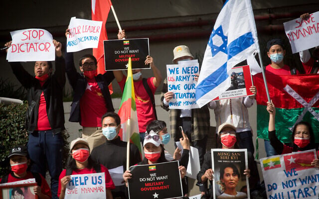 Myanmarese residents in Israel protest against the military coup which took place in Myanmar, outside the Chinese Embassy in Tel Aviv on February 15, 2021. (Miriam Alster/Flash90) Myanmarese residents in Israel protest against the military coup which took place in Myanmar, outside the Chinese Embassy in Tel Aviv on February 15, 2021. (Miriam Alster/Flash90)