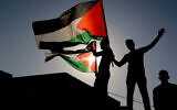 Illustrative: Israeli Arabs march during a protest marking Land Day, in Arraba, northern Israel, on March 30, 2021 (Jamal Awad/Flash90)