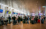Travelers at Ben Gurion International Airport near Tel Aviv on April 18, 2021. (Yossi Aloni/Flash90)