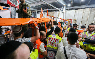 Israeli rescue forces and police at the scene after a mass fatality scene during the celebrations of the Jewish holiday of Lag Baomer on Mt. Meron, in northern Israel on April 30, 2021. (David Cohen/Flash90)