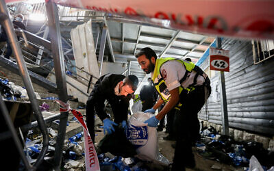 Israeli rescue forces and police at the scene after a mass fatality scene during the celebrations of the Jewish holiday of Lag Baomer on Mt. Meron, in northern Israel on April 30, 2021. (David Cohen/Flash90) Israeli rescue forces and police at the scene after a mass fatality scene during the celebrations of the Jewish holiday of Lag Baomer on Mt. Meron, in northern Israel on April 30, 2021. (David Cohen/Flash90)