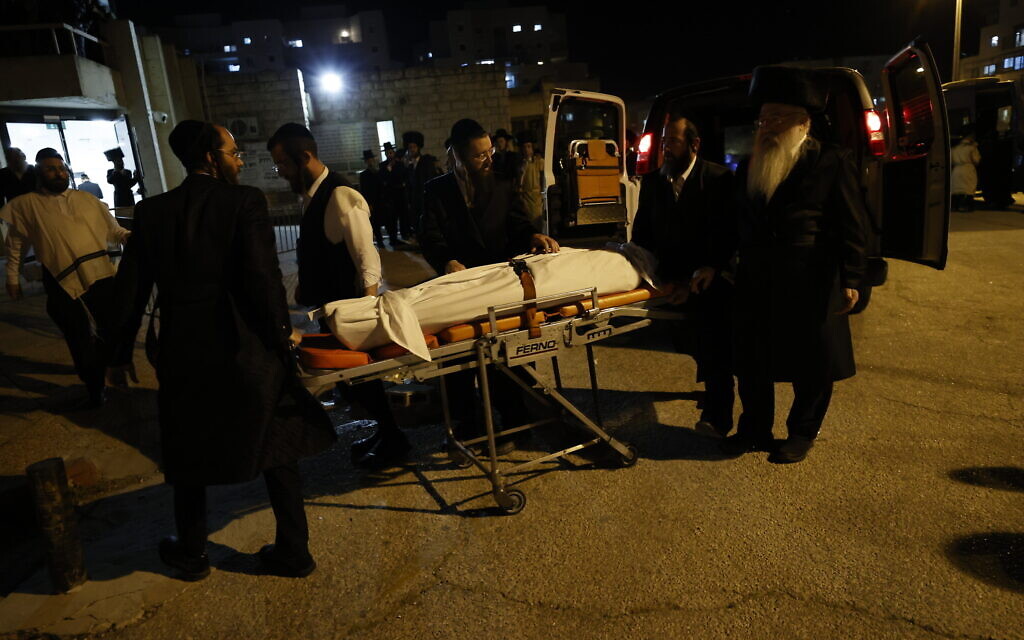 Ultra-Orthodox Jews attend the funeral of a victim of fatal crushing during Lag B'Omer celebrations on Mount Meron, in Meron, northern Israel, May 1, 2021. (Yonatan Sindel/Flash90)