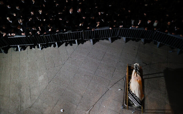The funeral of Menahem Knowlowitz, one of the victims of the Meron disaster., May 01, 2021. (Yonatan Sindel/Flash90) The funeral of Menahem Knowlowitz, one of the victims of the Meron disaster., May 01, 2021. (Yonatan Sindel/Flash90)