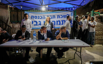 MK Itamar Ben Gvir seen with Lehava chairman Benzi Gopstein in the East Jerusalem neighborhood of Sheikh Jarrah on May 6, 2021. (Olivier Fitoussi/Flash90)
